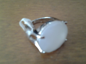 Anillo Plateado con piedra blanca redonda